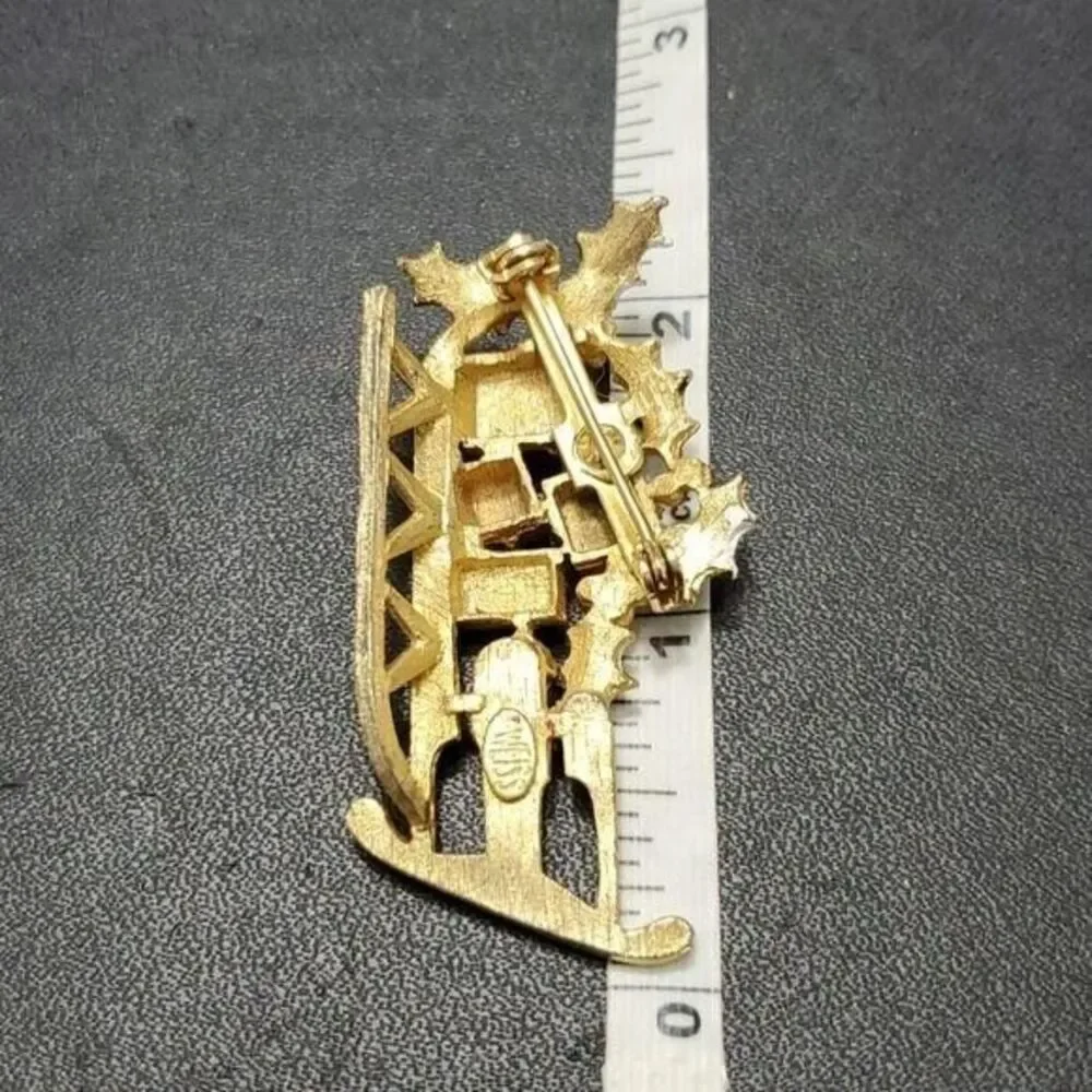 Vintage Weiss holiday sled brooch gold tone red green